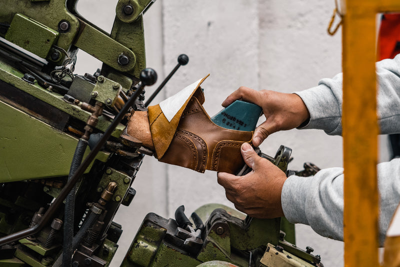Person manufacturing a safety shoe
