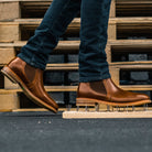 Puncture resistant Wallace boots standing on nails
