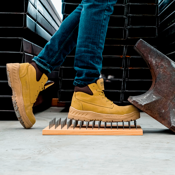 Alpa Steel Toe boot lifestyle photo standing on nails