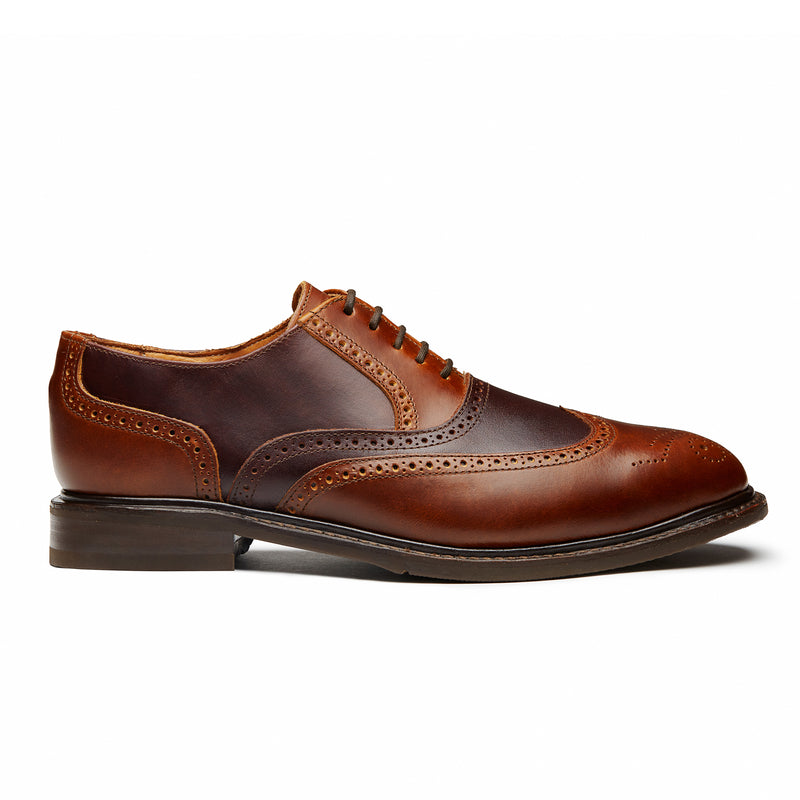Eagle features ravels detailing and the finest combination of two different color leather to make a powerful statement.  Be ready for any event with this strong and versatile oxfords.  Hand-Finished full-grain leather, Steel Toe, Goodyear Welt construction and Puncture resistant outsoles.