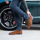 Lifestyle photo of the Bronx boot with a Car on the back